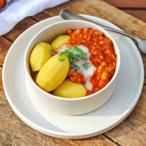 Hungarian-style bean stew with boiled potatoes