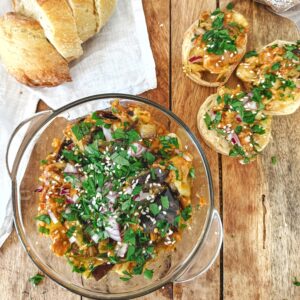 Aubergine with vegan 'sausage'