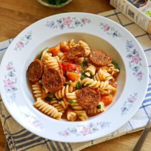 Fusilli with Pumpkin and Oat Cream, served with vegan sausage rings